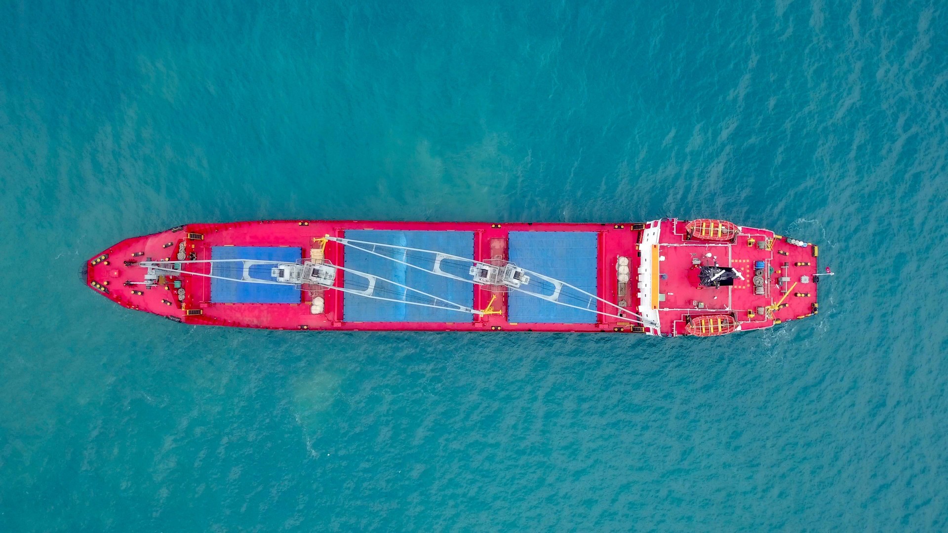General cargo ship at sea - Aerial image